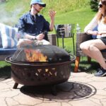 Sunnydaze Crossweave Outdoor Fire Pit - Wood-Burning Fire Pit for Outside with Spark Screen, Poker and Round Cover - 36-Inch - Bronze - Image 9