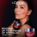 L'Oreal Paris Revitalift Triple Power Anti-Aging Face Moisturizer, Pro Retinol, Hyaluronic Acid & Vitamin C to Reduce Wrinkles, Firm & Brighten Skin, 2.55 Oz - Image 3
