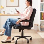 Amazon Basics Classic Puresoft PU Padded Mid-Back Office Desk Chair with Armrest, Easy Assembly, Sturdy Metal Base, Wheels, 275lb Support, 26"D x 23.75"W x 42"H, Black - Image 3