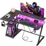Korfile 40 Inch Gaming Desk with Power Outlet & LED Lights, L Shaped Computer Gaming Table with 3 Tiers Storage Shelves, Corner Gamer Desk with Monitor Stand for Small Space, Carbon Fiber Black - Image 2