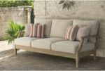 Signature Design by Ashley Clare View Outdoor Patio Sofa, 4 Throw Pillows, Nuvella Weather Resistant Fabric, Eucalyptus Wood, 81" W x 35" D x 32" H, Beige - Image 2